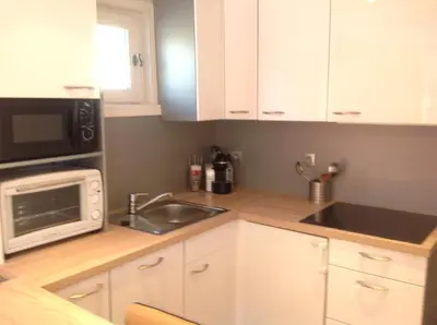 Cuisine ou kitchenette dans l'établissement Prariond 5
