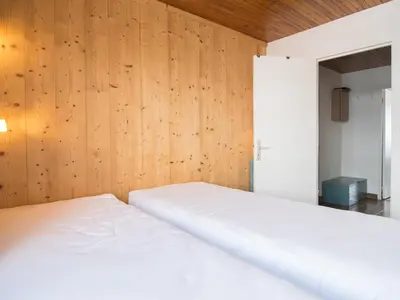 Un ou plusieurs lits dans un hébergement de l'établissement 2 pièces sud/ouest, ski aux pieds, wifi gratuit - FR-1-449-26