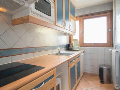 Cuisine ou kitchenette dans l'établissement 2 pièces sud/ouest, ski aux pieds, wifi gratuit - FR-1-449-26