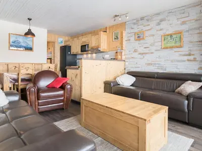 Coin salon dans l'établissement Luxe 2 pièces, ski aux pieds, balcon vue pistes - FR-1-449-33