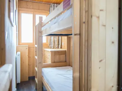 Un ou plusieurs lits dans un hébergement de l'établissement Luxe 2 pièces, ski aux pieds, balcon vue pistes - FR-1-449-33