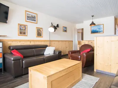 Coin salon dans l'établissement Luxe 2 pièces, ski aux pieds, balcon vue pistes - FR-1-449-33