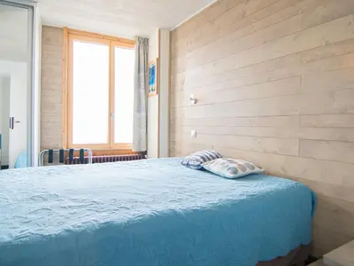 Un ou plusieurs lits dans un hébergement de l'établissement Luxe 2 pièces, ski aux pieds, balcon vue pistes - FR-1-449-33