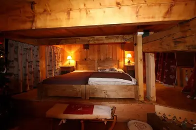 Un ou plusieurs lits dans un hébergement de l'établissement Appartement duplex de charme hyper centre à Val d'Isère