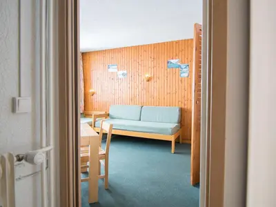 Coin salon dans l'établissement Appartement 2 pièces sud/ouest avec Wifi, proche pistes - FR-1-449-157