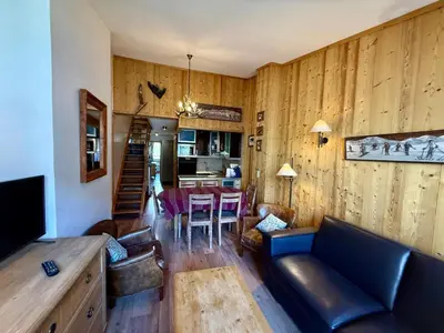 Coin salon dans l'établissement Duplex 4 pièces à 20m des pistes, 3 chambres - FR-1-449-24