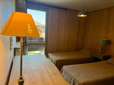 Un ou plusieurs lits dans un hébergement de l'établissement Duplex 4 pièces à 20m des pistes, 3 chambres - FR-1-449-24