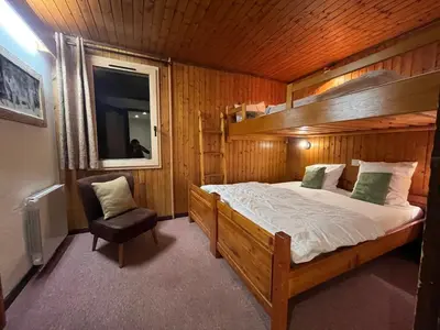 Un ou plusieurs lits dans un hébergement de l'établissement Chalet - Apt 5pax au pied des pistes - parking - skiroom - cheminée - balcons