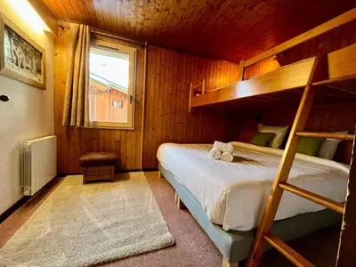 Un ou plusieurs lits dans un hébergement de l'établissement Chalet - Apt 5pax au pied des pistes - parking - skiroom - cheminée - balcons