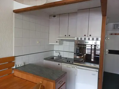 Cuisine ou kitchenette dans l'établissement Studio Sud-Ouest au Coeur des Commerces - FR-1-449-58