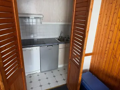 Cuisine ou kitchenette dans l'établissement Charmant 2 pièces sud à Tignes avec wifi, proche pistes - FR-1-449-88