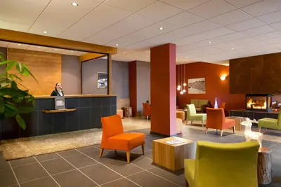 Coin salon dans l'établissement Résidence Club MMV L'Étoile des Cimes