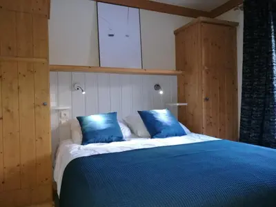 Un ou plusieurs lits dans un hébergement de l'établissement Superbe appt 2 chambres Arc 1950