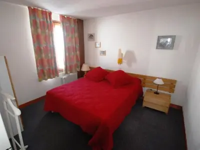 Un ou plusieurs lits dans un hébergement de l'établissement Appartement 2 pièces plein sud avec wifi à 500m des pistes - FR-1-449-147
