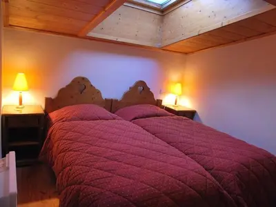 Un ou plusieurs lits dans un hébergement de l'établissement Duplex 3 Chambres Les Arcs 1800, Accès Direct aux Pistes, 6 Personnes - FR-1-352-1