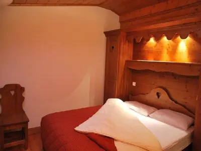 Un ou plusieurs lits dans un hébergement de l'établissement Duplex 3 Chambres Les Arcs 1800, Accès Direct aux Pistes, 6 Personnes - FR-1-352-1