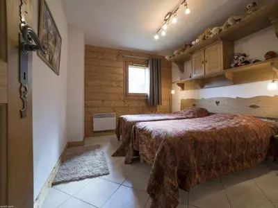 Un ou plusieurs lits dans un hébergement de l'établissement Appartement 3 pièces ski aux pieds, parking, internet inclus - FR-1-352-2