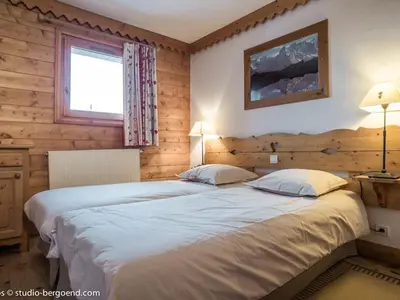 Un ou plusieurs lits dans un hébergement de l'établissement Superbe appartement aux Arcs 1800 - 8 pers, espace détente, sans animaux - FR-1-352-7