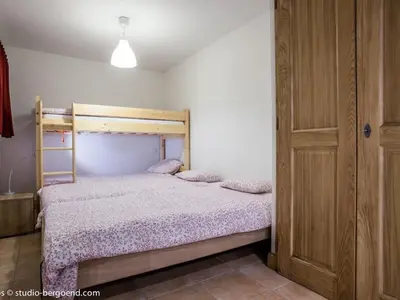 Un ou plusieurs lits dans un hébergement de l'établissement Appartement spacieux pour 12 pers. aux Arcs 1800 avec parking couvert - FR-1-352-15
