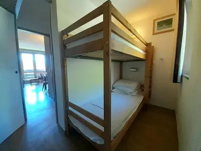 Un ou plusieurs lits dans un hébergement de l'établissement Appartement rénové skis aux pieds à Belle Plagne - FR-1-351-60