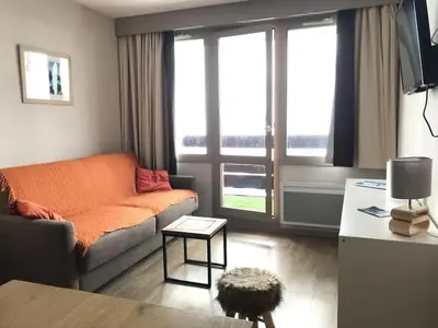 Coin salon dans l'établissement Appartement rénové skis aux pieds à Belle Plagne - FR-1-351-60