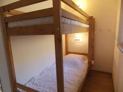 Un ou plusieurs lits dans un hébergement de l'établissement Appartement rénové skis aux pieds à Belle Plagne - FR-1-351-60