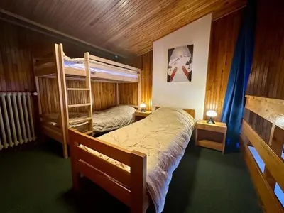 Un ou plusieurs lits dans un hébergement de l'établissement Confort 2 Pièces Sud-Ouest Tignes, Ski aux Pieds - FR-1-449-135