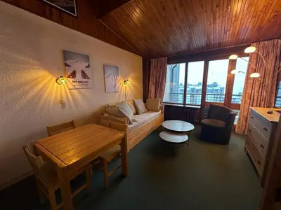Coin salon dans l'établissement Confort 2 Pièces Sud-Ouest Tignes, Ski aux Pieds - FR-1-449-135