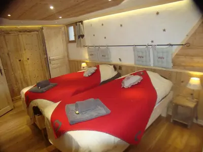 Un ou plusieurs lits dans un hébergement de l'établissement Chalet l'Avalin