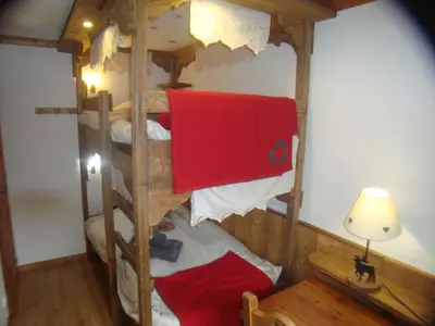 Un ou plusieurs lits dans un hébergement de l'établissement Chalet l'Avalin