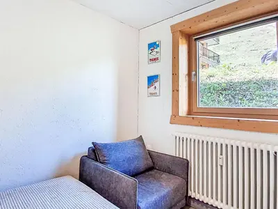 Coin salon dans l'établissement Apartment Horizon 2000 - Le Lac by Interhome