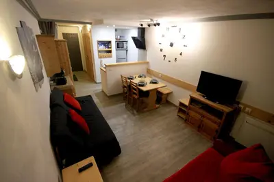 Télévision ou salle de divertissement dans l'établissement Appartement Le Thuria