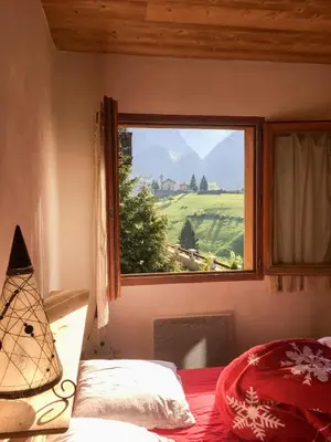 Un ou plusieurs lits dans un hébergement de l'établissement Chalet des Trappeurs Coeur Vanoise 15 persons