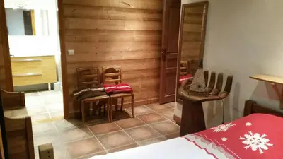 Un ou plusieurs lits dans un hébergement de l'établissement Chalet des Trappeurs Coeur Vanoise 15 persons