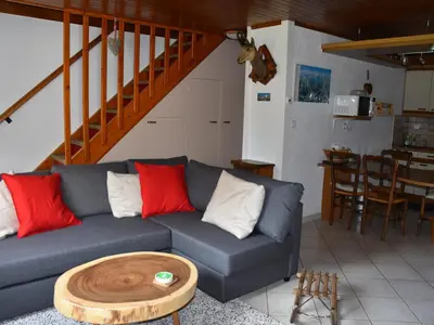 Coin salon dans l'établissement Chalet mitoyen avec jardinet, 3 pièces, 6 personnes - FR-1-464-8