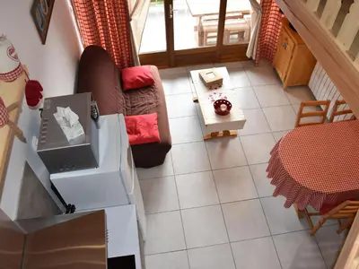 Coin salon dans l'établissement Studio mezzanine à Champagny, 4 pers, balcon sud - FR-1-464-17