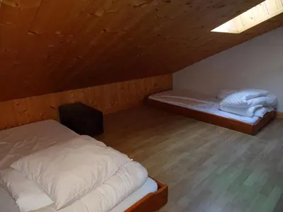 Un ou plusieurs lits dans un hébergement de l'établissement Triplex confortable 12 pers, terrasse, garage, Champagny-en-Vanoise - FR-1-464-19