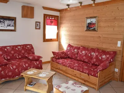 Coin salon dans l'établissement Appartement cosy et lumineux avec jardin, pour 6 personnes - FR-1-464-26
