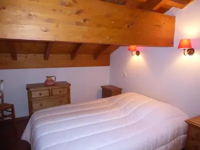Un ou plusieurs lits dans un hébergement de l'établissement Duplex 4 pièces, balcon sud, garage, 6 pers - FR-1-464-36