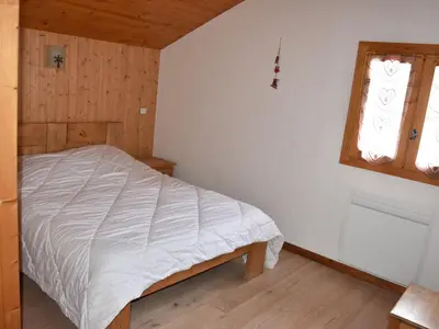 Un ou plusieurs lits dans un hébergement de l'établissement Duplex spacieux avec garage proche centre Champagny - FR-1-464-41