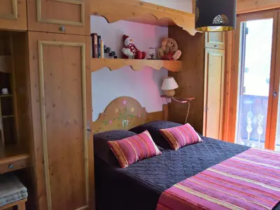 Un ou plusieurs lits dans un hébergement de l'établissement Appartement familial avec balcon sud et parking dans quartier résidentiel - FR-1-464-46