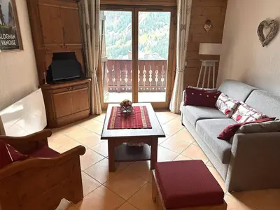 Coin salon dans l'établissement Appartement familial avec balcon sud et parking dans quartier résidentiel - FR-1-464-46