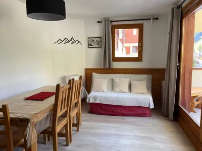 Un ou plusieurs lits dans un hébergement de l'établissement Appartement ensoleillé pour 7 pers, près du centre - FR-1-464-49