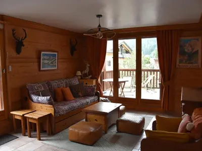 Coin salon dans l'établissement Appartement spacieux, 3 étoiles, max 8 pers, 2 terrasses - FR-1-464-54