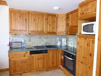 Cuisine ou kitchenette dans l'établissement Confortable T3 avec grand balcon - Animaux admis - FR-1-464-67