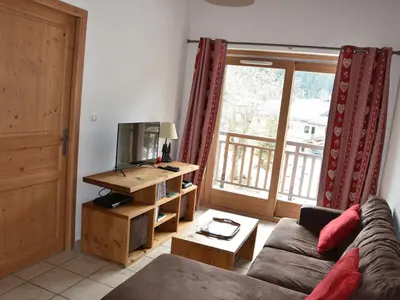 Télévision ou salle de divertissement dans l'établissement Appartement au dernier étage avec 2 balcons, proche téléphérique - FR-1-464-87