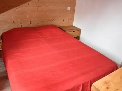 Un ou plusieurs lits dans un hébergement de l'établissement Appartement au dernier étage avec 2 balcons, proche téléphérique - FR-1-464-87