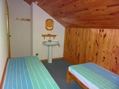 Un ou plusieurs lits dans un hébergement de l'établissement Duplex lumineux près des pistes, parking couvert, 4 pers. - FR-1-464-95