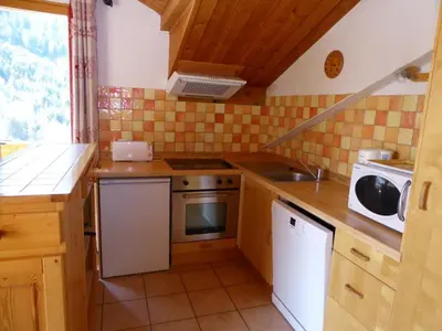 Cuisine ou kitchenette dans l'établissement Dernier étage chalet, 3 pièces, 6 pers, proche pistes - FR-1-464-106