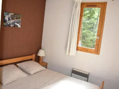 Un ou plusieurs lits dans un hébergement de l'établissement Appartement ensoleillé, balcon sud, 4 pers, centre Pralognan-la-Vanoise - FR-1-464-112